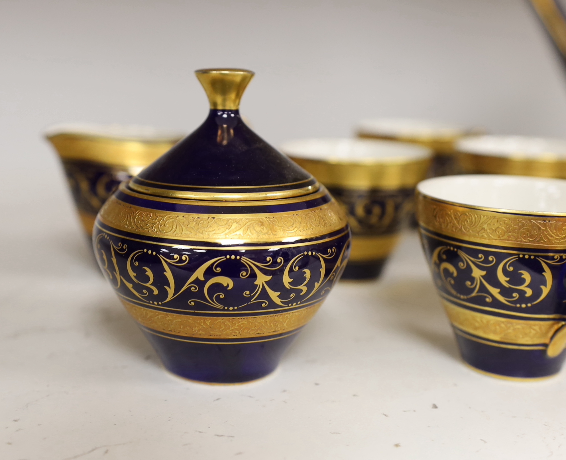 A Lindner cobalt and gilt part coffee set